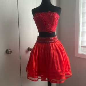 Stunning deep red two piece skirt/top…new without tags